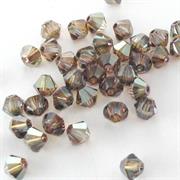 BICONO 4MM CRYSTAL BRONZE SHADE     (ART.5328 SWAROVSKI ROMBETTO)