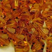 BICONO 6MM TOPAZIO                  (ART.5301 SWAROVSKI ROMBETTO)