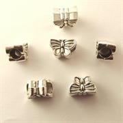 DISTANZIALE FARFALLA 13X9MM PER LYCRA E TUBOL.PVC GALV.ARG.