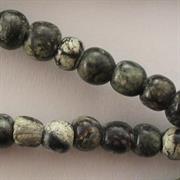 PIETRE BAGUIO TONDO 6MM. (1 filo circa 90 pz.)